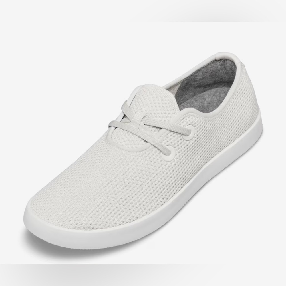 Slightly worn Allbirds lightweight white sneakers.
